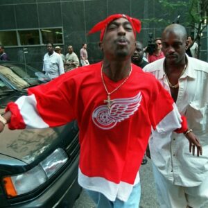 Tupac leaving court in anger with Morpeme Shakur.
