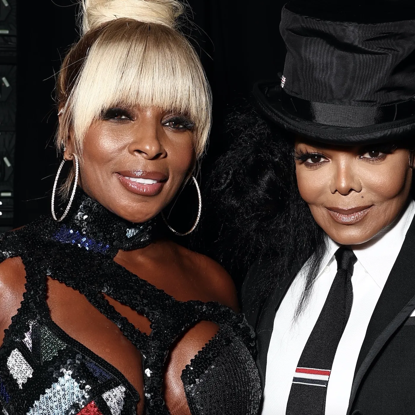 Legendary artists of Janet Jackson and Mary J. Blige at award show.
