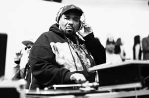 Afrika Bambaataa performing during early hip hop era, pioneer behind Planet Rock