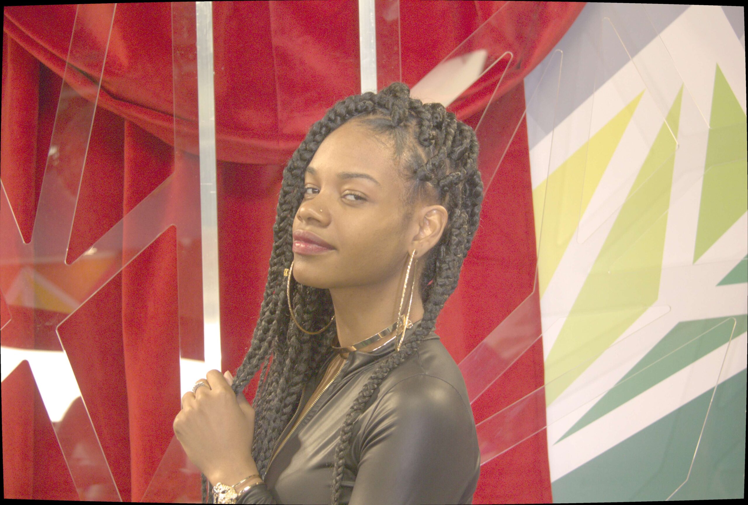 Alicia Cinnamon featured in WWETV Media article image about Drake and Toronto support debate with Canadian flag background.