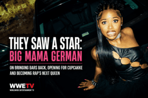 Big Mama German beside a car in a still from the SLAY! music video for WWETV’s independent women in hip-hop profile.